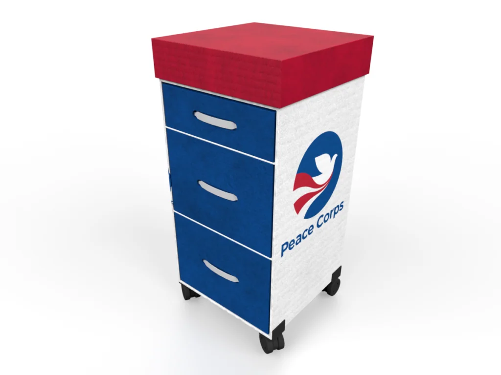 Mobile storage cart with red top, blue and white body featuring Peace Corps logo and three drawers with handles, mounted on black casters