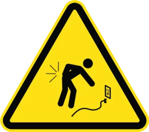Yellow warning triangle with black border showing stick figure reacting to electrical shock from a wall outlet